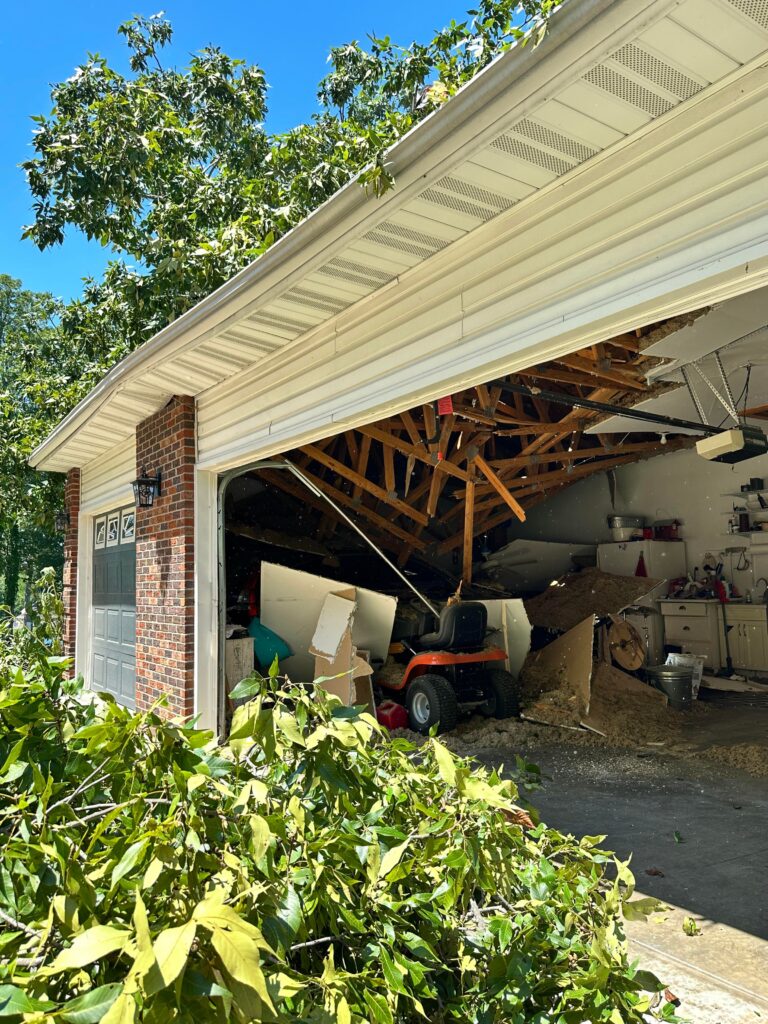 Tree damaging a garage